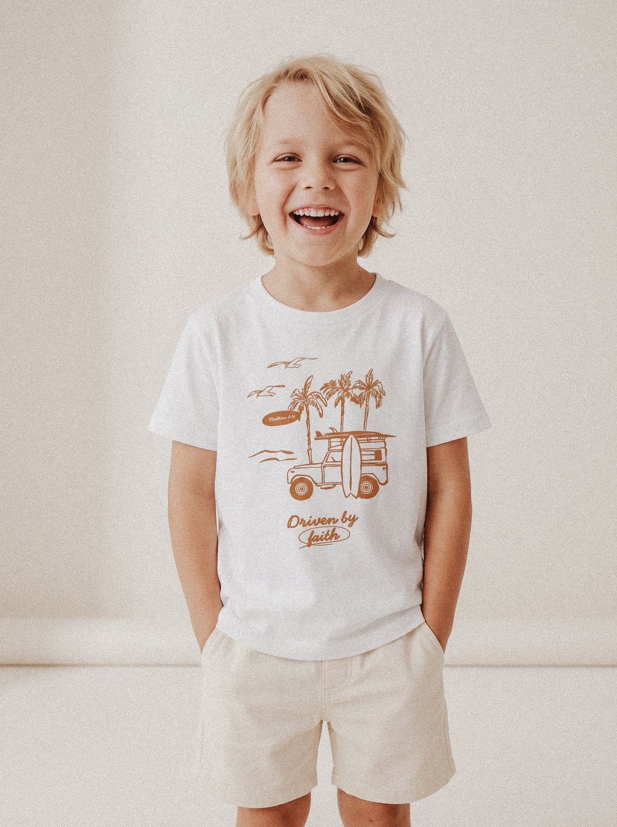 KIDS REGULAR FIT T-SHIRT DRIVEN BY FAITH - model_1.jpg - 2